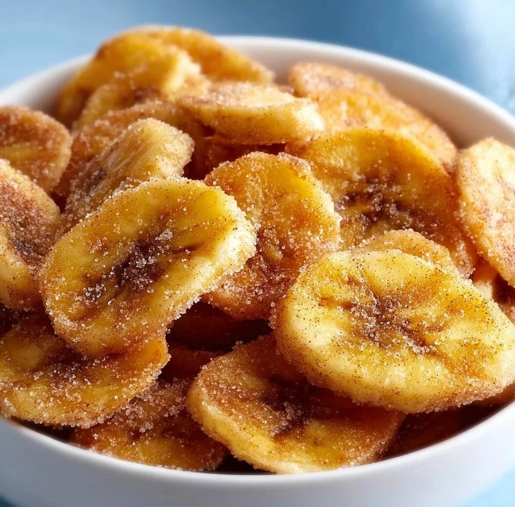 Cinnamon-sugar air fryer banana chips ready to enjoy as a healthy snack
